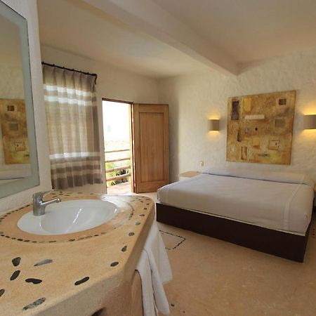 Hotel Plaza Tangolunda Esterno foto
