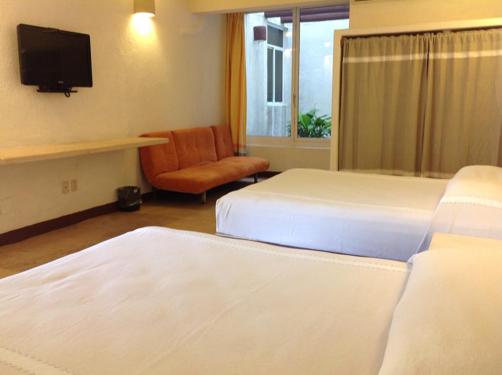 Hotel Plaza Tangolunda Esterno foto