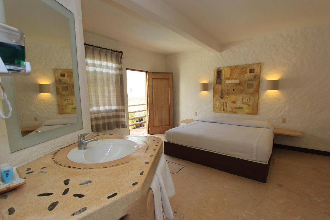 Hotel Plaza Tangolunda Esterno foto