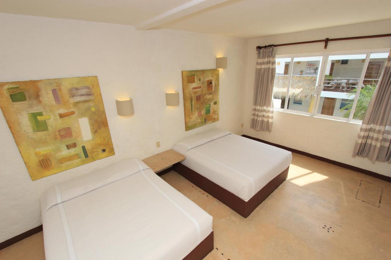 Hotel Plaza Tangolunda Esterno foto